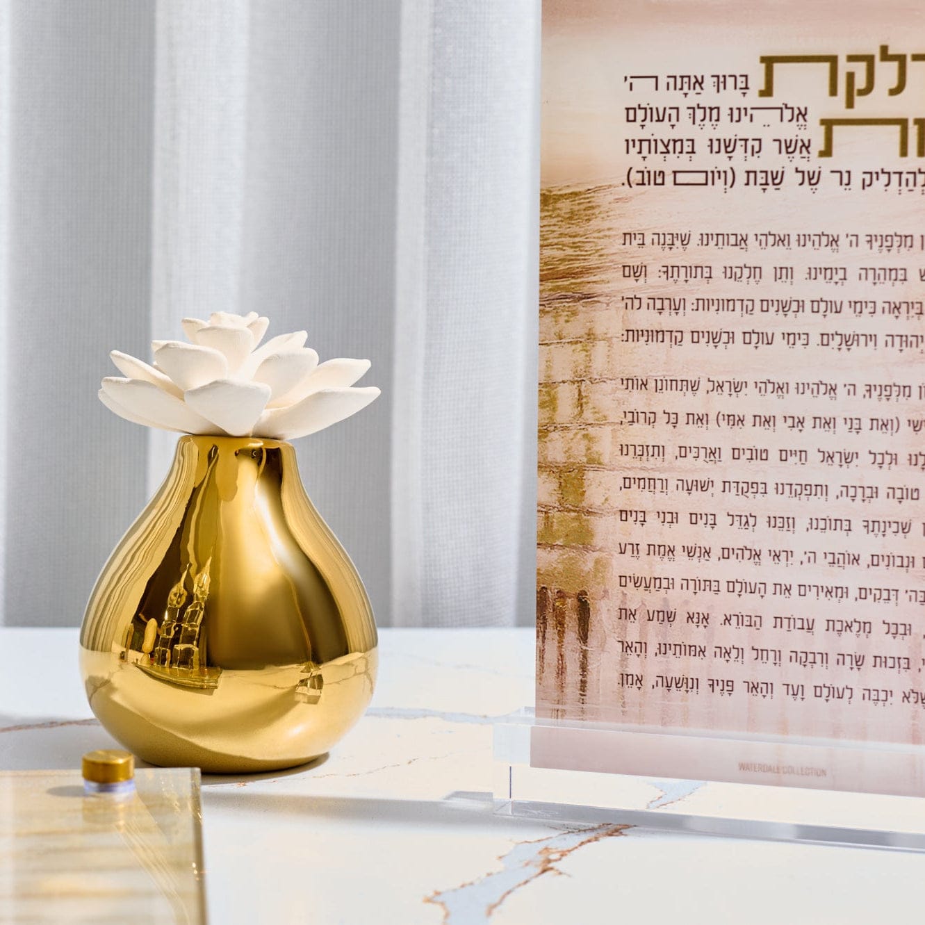 Sophisticated Teardrop Flower Diffuser by Waterdale Collection, luxury hostess or housewarming gift featuring a modern organic shape and long-lasting floral scent delivery.
