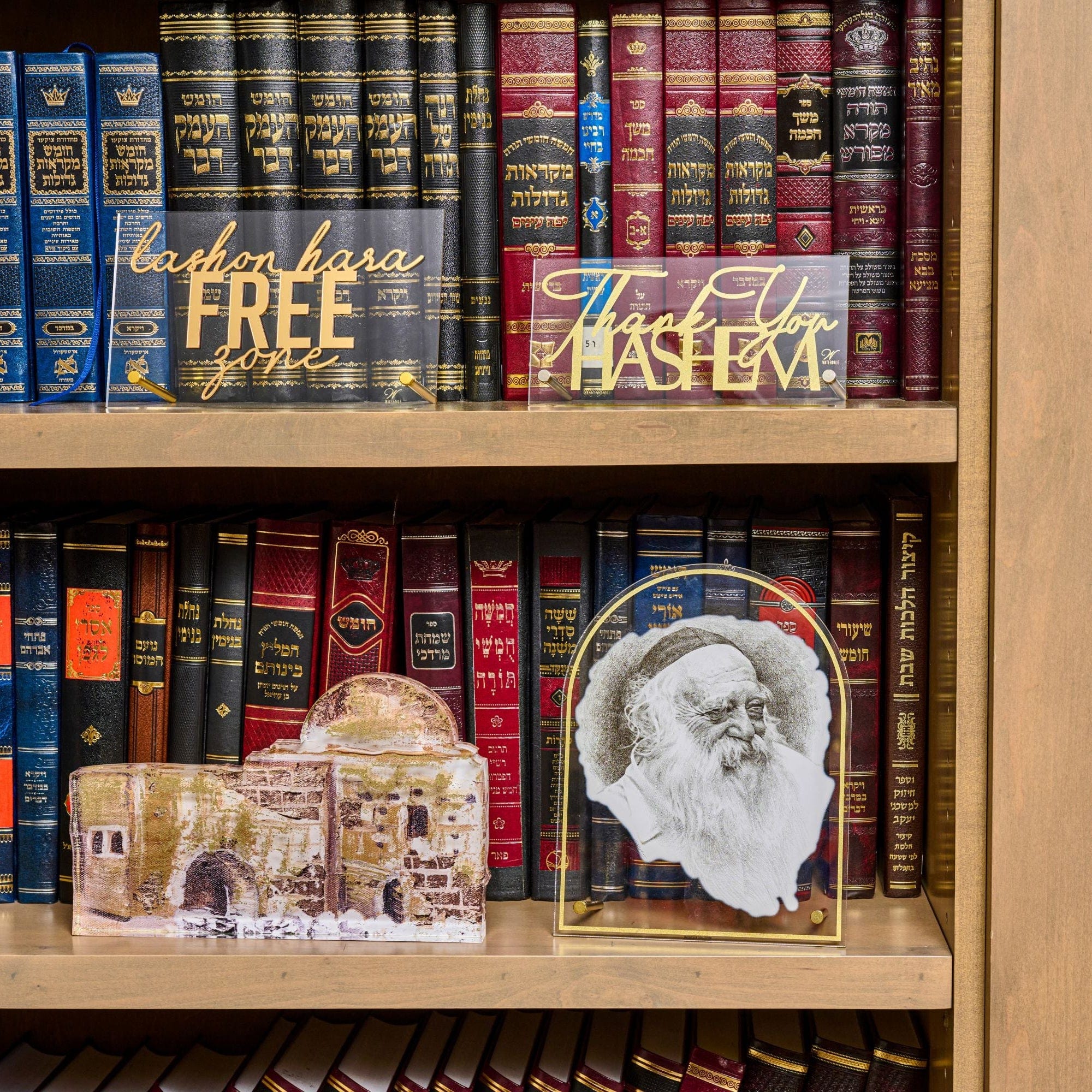 Kever Rochel Sculpture on a book shelf.