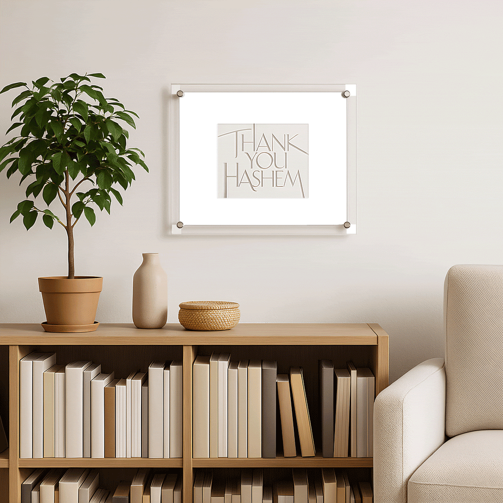 Thank You Hashem Classic 2.0  Wall Art displayed above a wooden bookshelf with neutral décor and a potted plant.