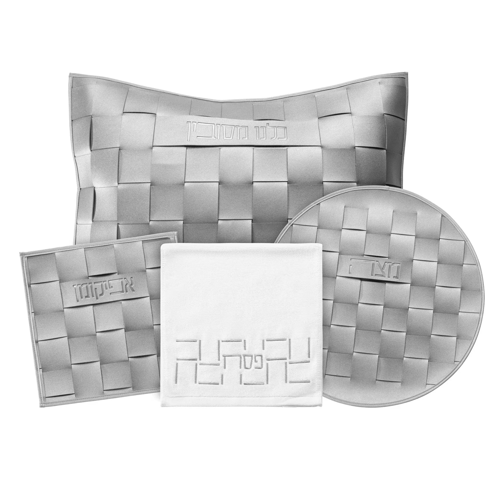 Woven leather Pesach set in silver and white featuring interlocking woven pattern pieces arranged with matching plate and circular serving dish.