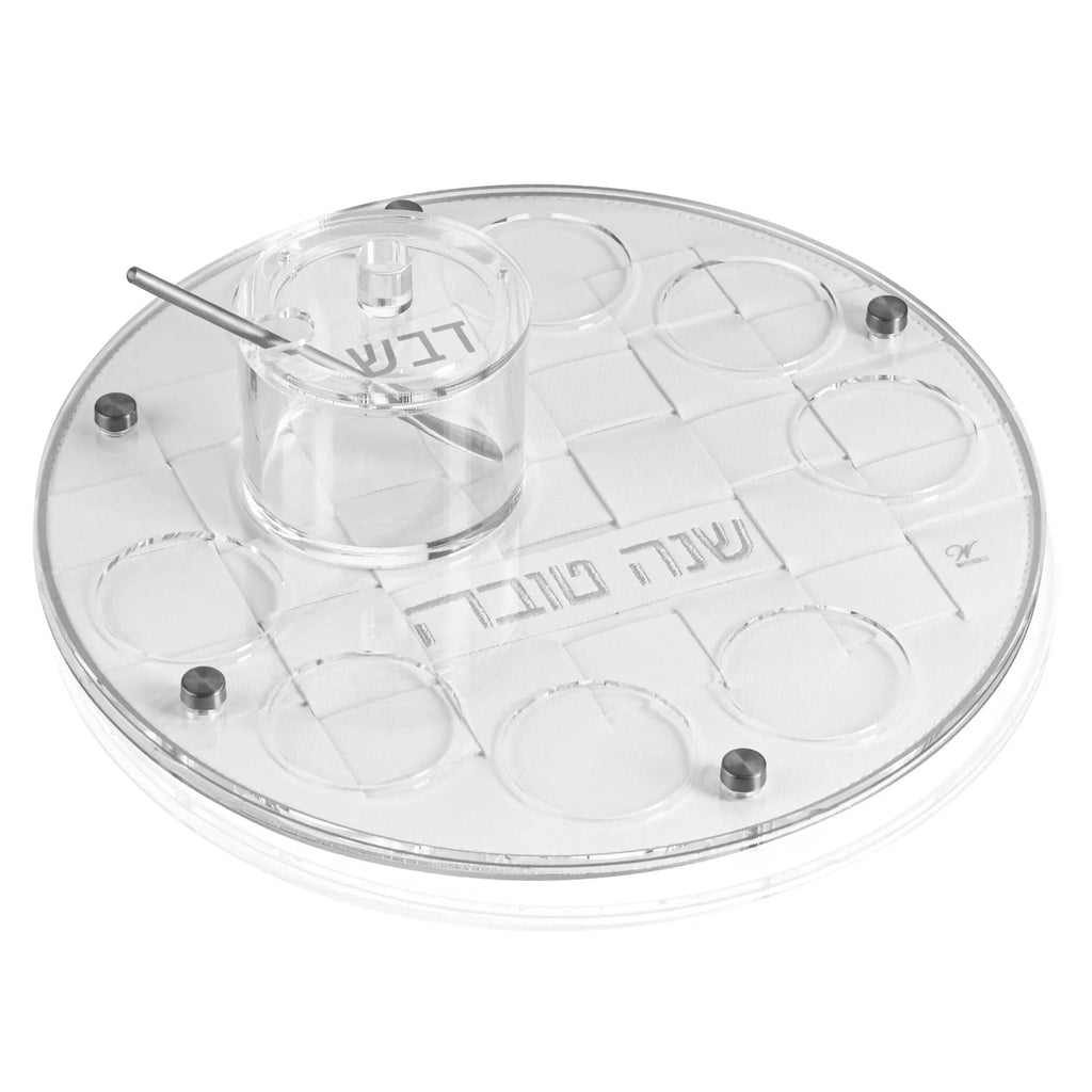 Clear woven simanim tray with six compartments and central bowl, designed for Passover Seder plate arrangement.
